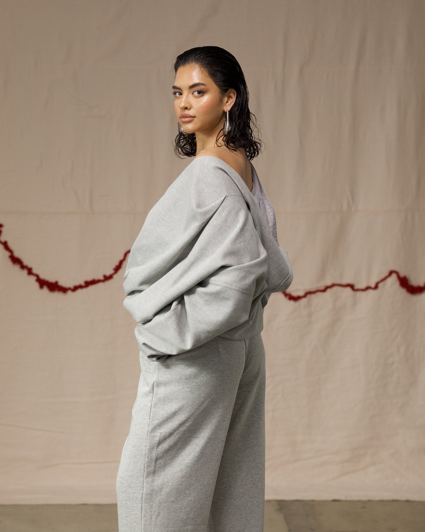 Side View of Grey Hooded Wrap Top by Mind Less