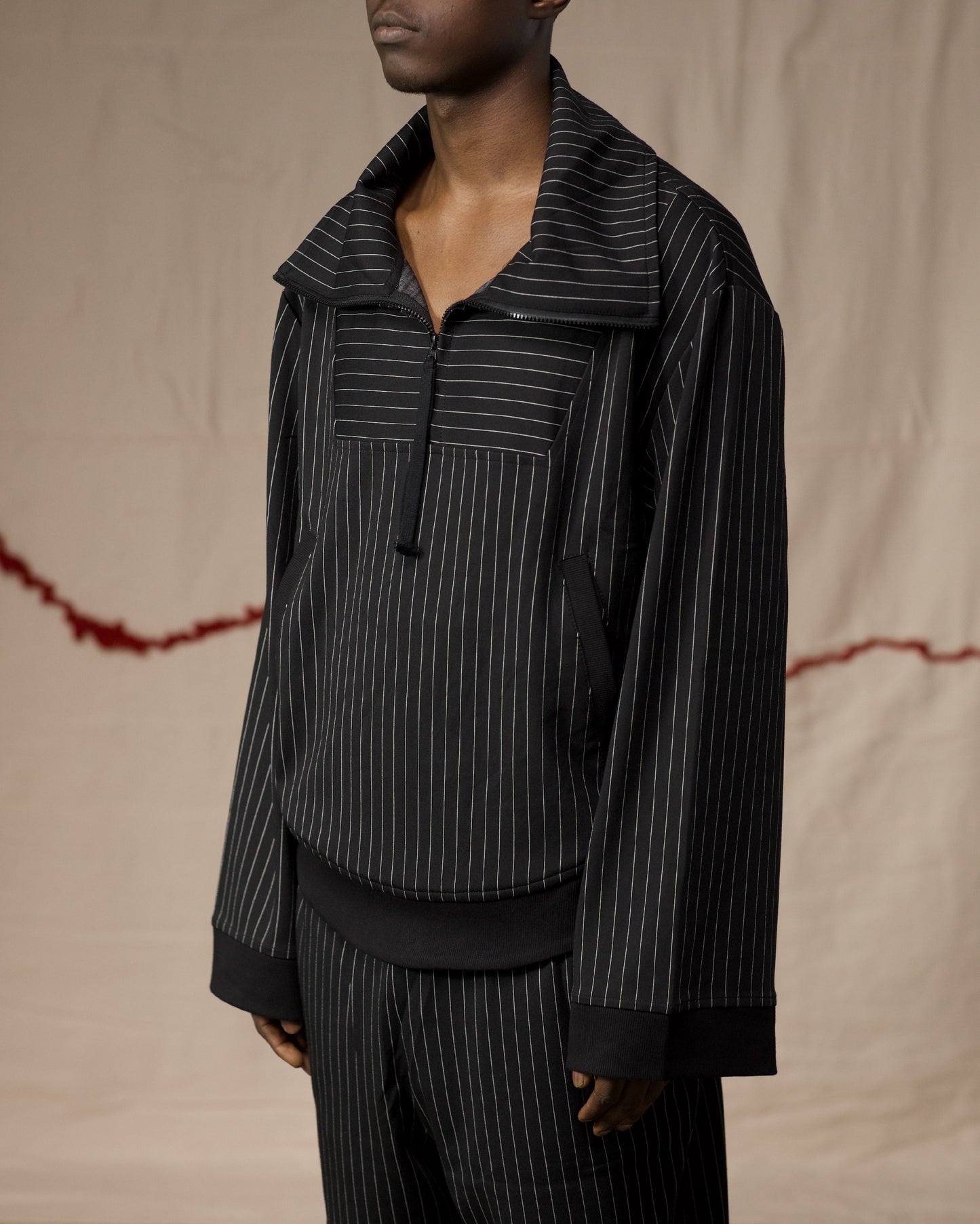 Side View of Model in Pinstripe Medio Pullover by Mind Less