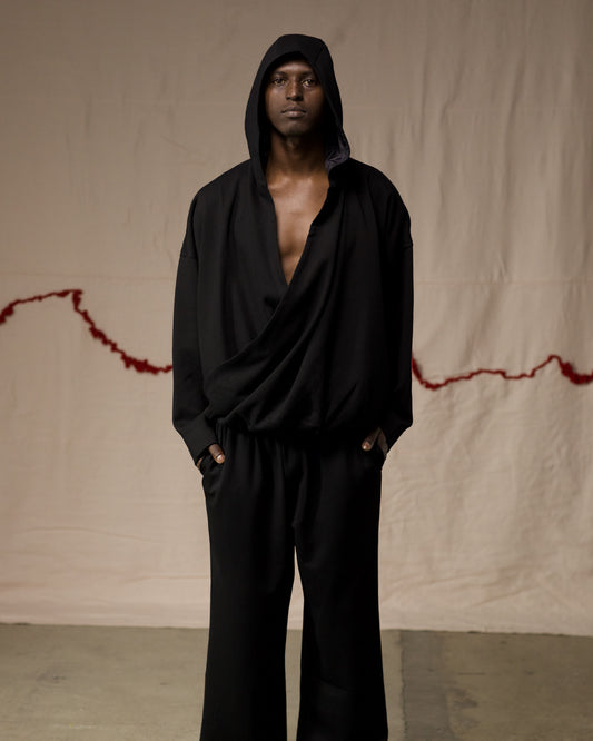 Front View of Black Hooded Wrap Top by Mind Less